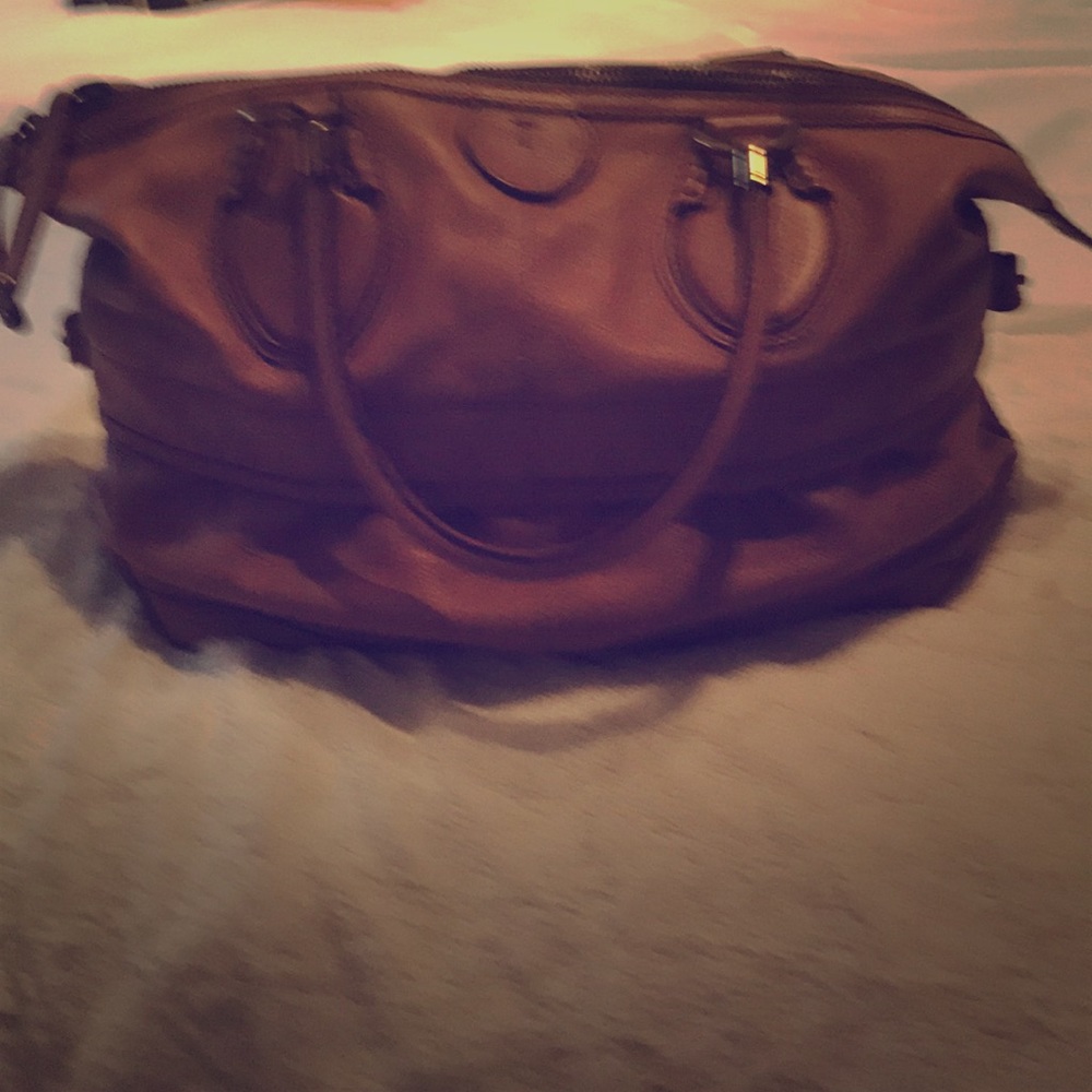 Travel bag. The color is camel